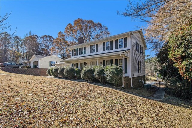 colonial home with a garage