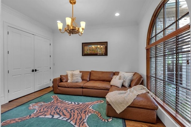 89 Somerset Ln, Cartersville, GA 30121 - living area with a chandelier, crown molding, wood finished floors, and recessed lighting