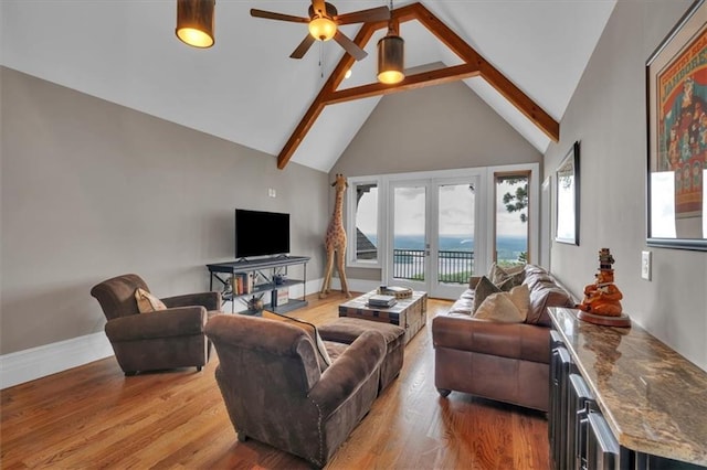 89 Somerset Ln, Cartersville, GA 30121 - living room with a ceiling fan, high vaulted ceiling, beam ceiling, light wood-style floors, and french doors