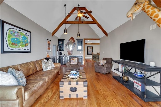 89 Somerset Ln, Cartersville, GA 30121 - living area featuring a ceiling fan, light wood-style flooring, and high vaulted ceiling