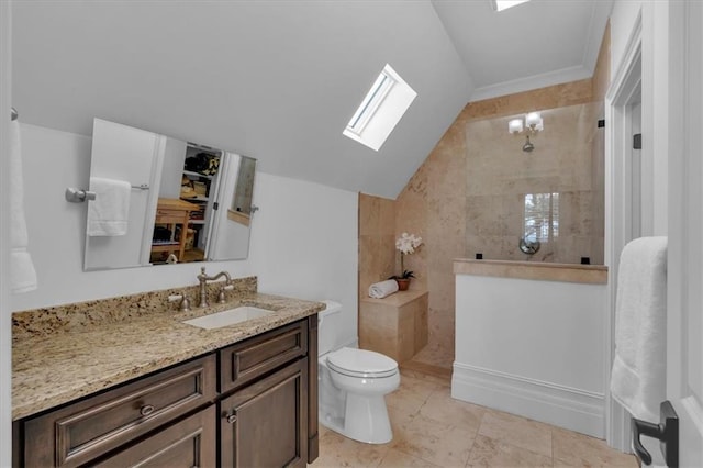 89 Somerset Ln, Cartersville, GA 30121 - full bathroom featuring a skylight, lofted ceiling, walk in shower, vanity, and toilet