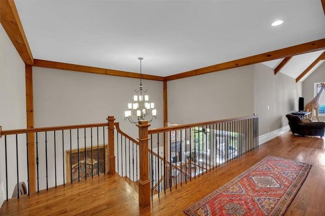 89 Somerset Ln, Cartersville, GA 30121 - staircase with a chandelier, wood finished floors, baseboards, healthy amount of natural light, and recessed lighting