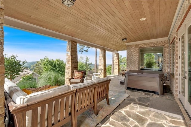 89 Somerset Ln, Cartersville, GA 30121 - view of patio / terrace featuring a hot tub and an outdoor living space