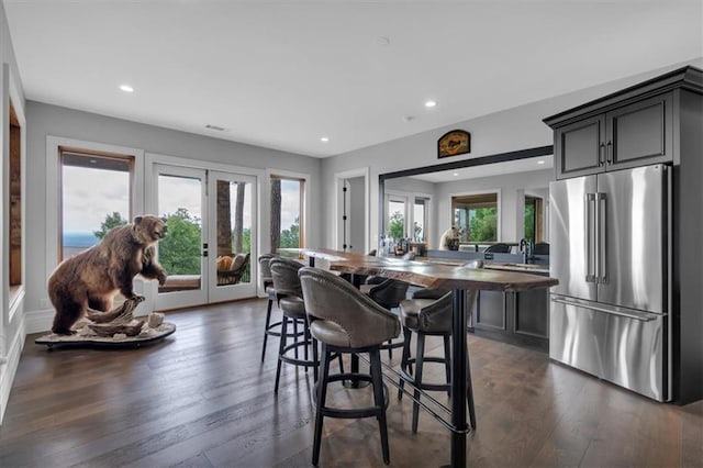 89 Somerset Ln, Cartersville, GA 30121 - kitchen with high end refrigerator, french doors, recessed lighting, dark wood-style flooring, and a peninsula