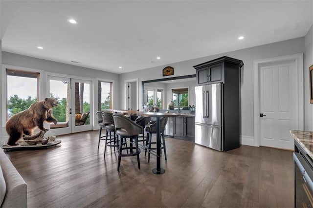 89 Somerset Ln, Cartersville, GA 30121 - dining area featuring french doors, dark wood-style floors, recessed lighting, and baseboards