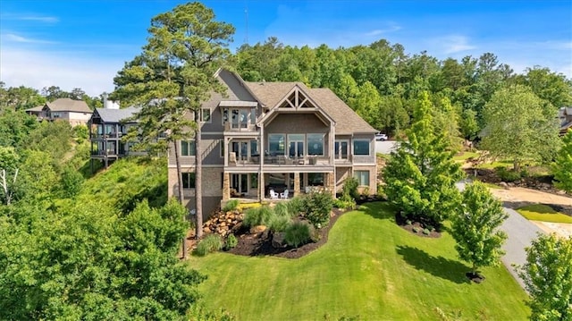 89 Somerset Ln, Cartersville, GA 30121 - back of house featuring a yard, a balcony, and a wooden deck