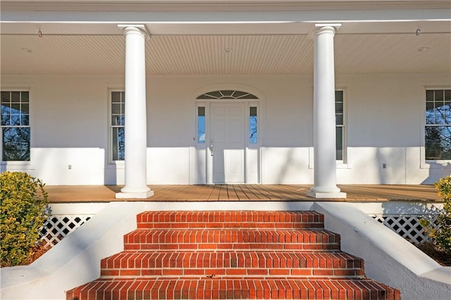 property entrance featuring covered porch