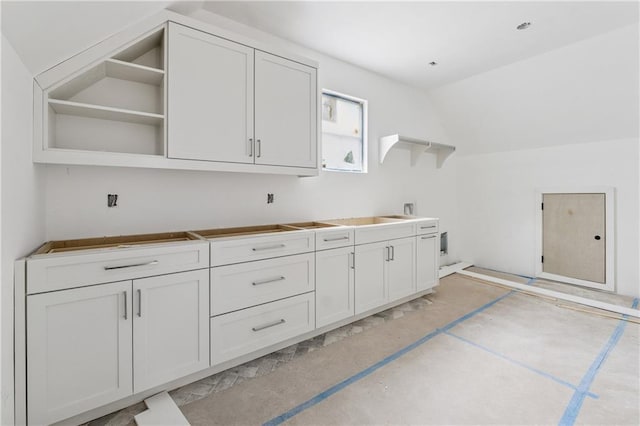 clothes washing area featuring cabinet space and washer hookup