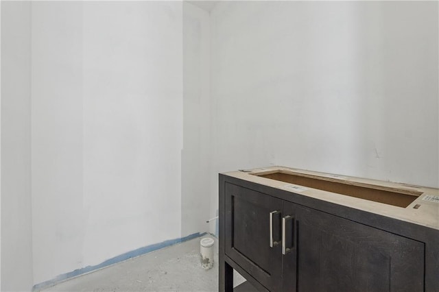 bathroom featuring concrete floors