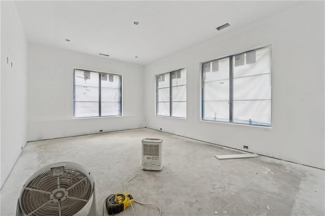 spare room featuring visible vents