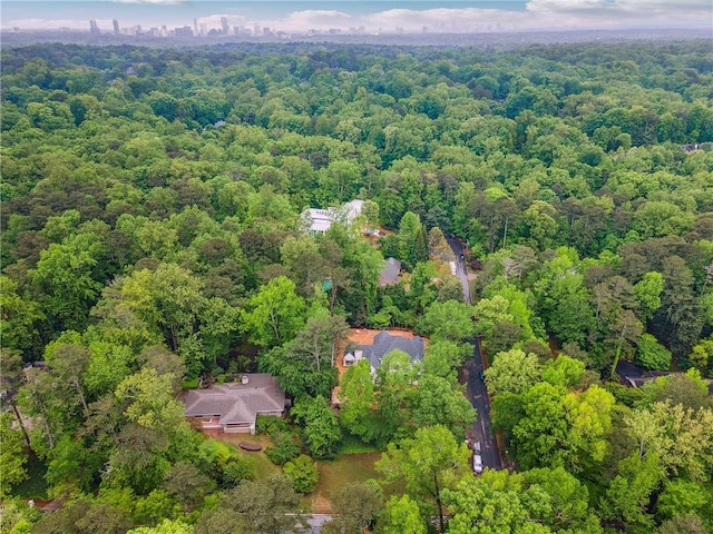 aerial view with a wooded view