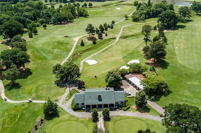 birds eye view of property with view of golf course