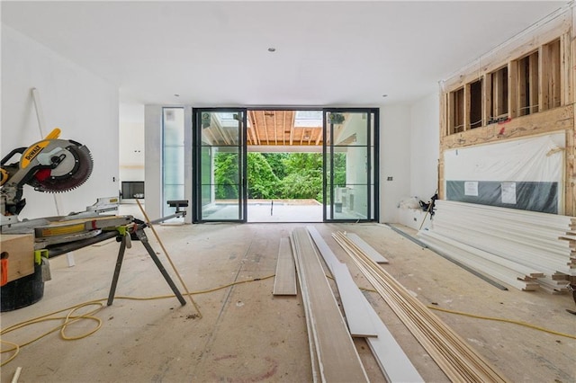 interior space featuring a wall of windows