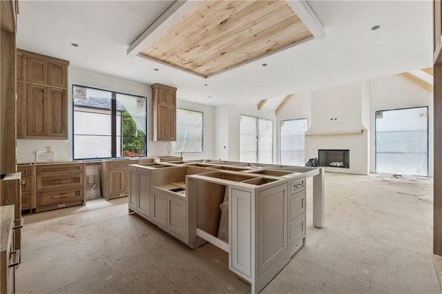 kitchen featuring a center island and a fireplace