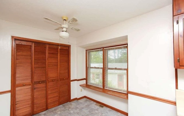 290 Timber Ridge Trl, Carrollton, GA 30117 - unfurnished bedroom with a closet and a ceiling fan
