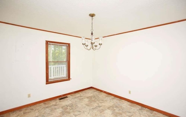 290 Timber Ridge Trl, Carrollton, GA 30117 - unfurnished room featuring a chandelier, stone finish floors, and ornamental molding