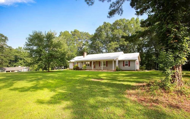 290 Timber Ridge Trl, Carrollton, GA 30117 - ranch-style home with a front lawn and a chimney