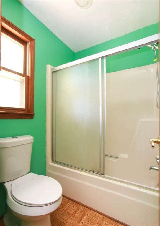 290 Timber Ridge Trl, Carrollton, GA 30117 - full bathroom with bath / shower combo with glass door and toilet