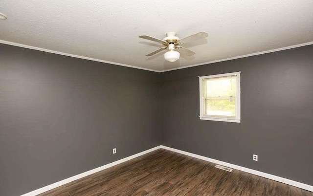 290 Timber Ridge Trl, Carrollton, GA 30117 - empty room featuring a ceiling fan, dark wood-style floors, and crown molding