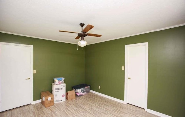 290 Timber Ridge Trl, Carrollton, GA 30117 - unfurnished room featuring crown molding, a ceiling fan, and wood finished floors