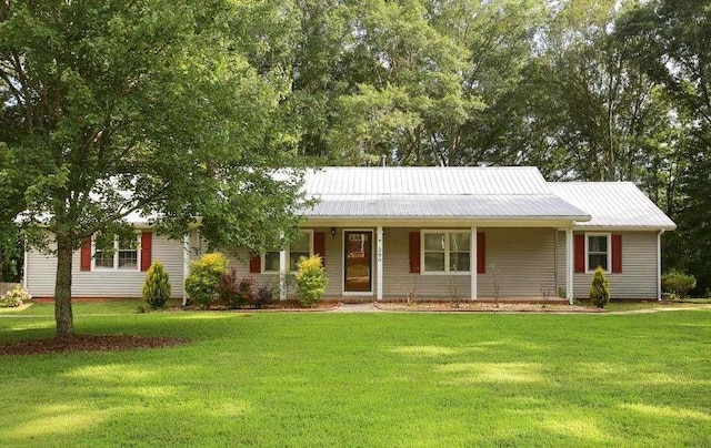 290 Timber Ridge Trl, Carrollton, GA 30117 - ranch-style house featuring a front lawn, a metal roof, and covered porch