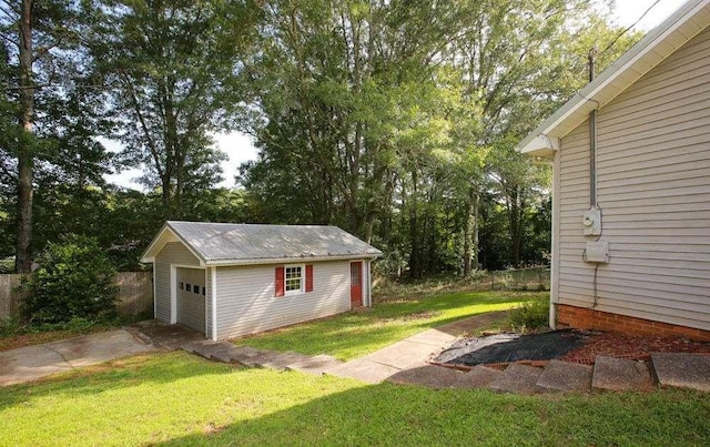 290 Timber Ridge Trl, Carrollton, GA 30117 - view of yard with an outdoor structure and a detached garage