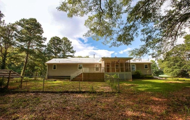 290 Timber Ridge Trl, Carrollton, GA 30117 - back of property featuring a sunroom, a metal roof, and stairway