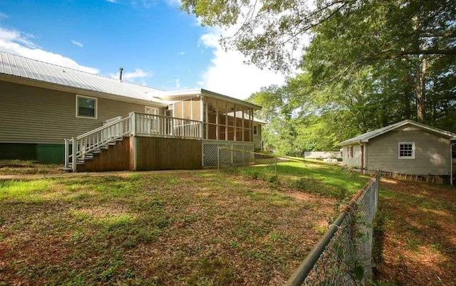 290 Timber Ridge Trl, Carrollton, GA 30117 - view of yard featuring a sunroom and stairway