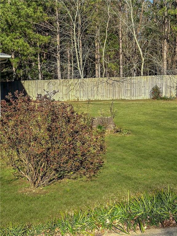 view of yard with fence