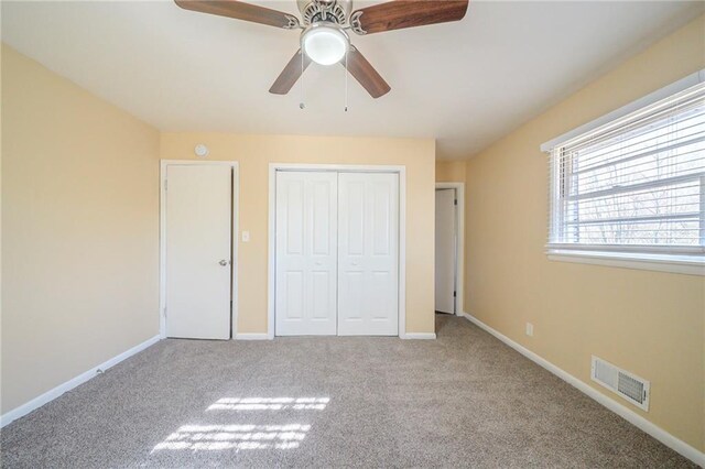 2725 Rainbow Forest Dr, Decatur, GA 30034 - unfurnished bedroom featuring light carpet and ceiling fan