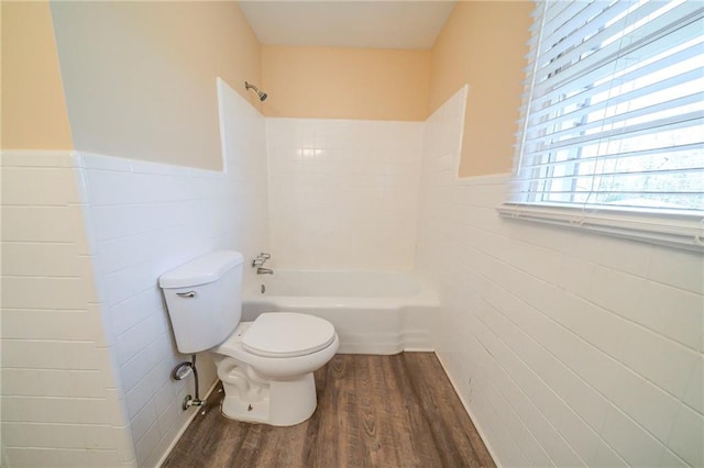 2725 Rainbow Forest Dr, Decatur, GA 30034 - bathroom featuring tile walls, hardwood / wood-style floors, shower / tub combination, and toilet