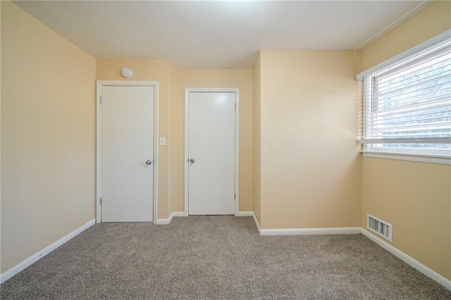 2725 Rainbow Forest Dr, Decatur, GA 30034 - unfurnished bedroom featuring light colored carpet
