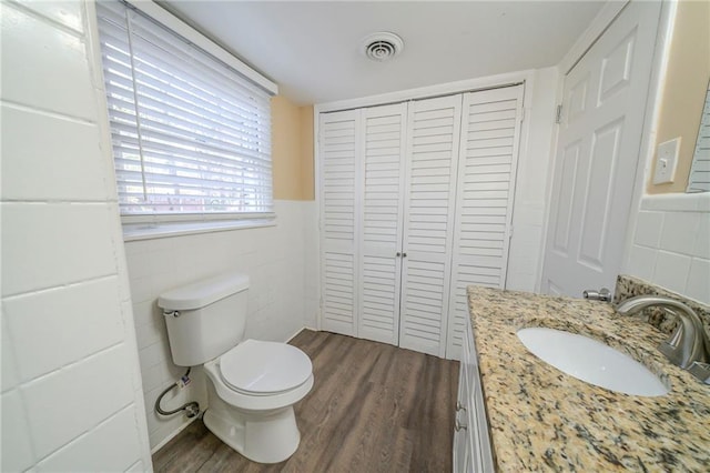 2725 Rainbow Forest Dr, Decatur, GA 30034 - bathroom featuring vanity, hardwood / wood-style flooring, and toilet