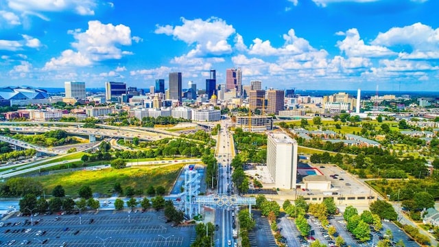 birds eye view of property featuring a city view