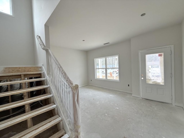 entrance foyer featuring baseboards