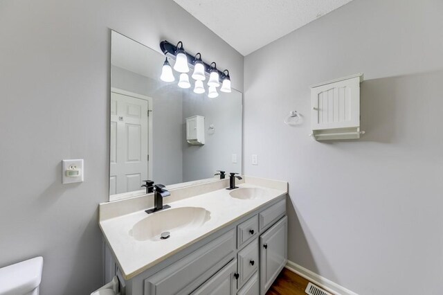 215 Twin Creek Shrs, Athens, GA 30605 - bathroom with double vanity and wood finished floors