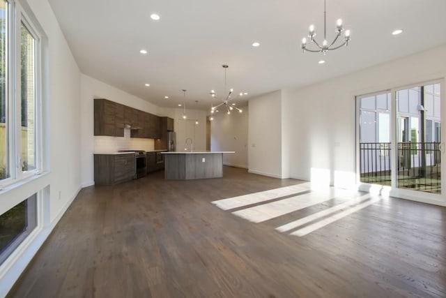 2194 Bristol Cv Unit 13, Chamblee, GA 30341 - unfurnished living room with a chandelier, dark wood-type flooring, and recessed lighting