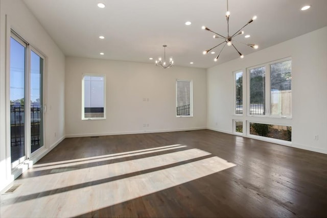 empty room with wood-type flooring