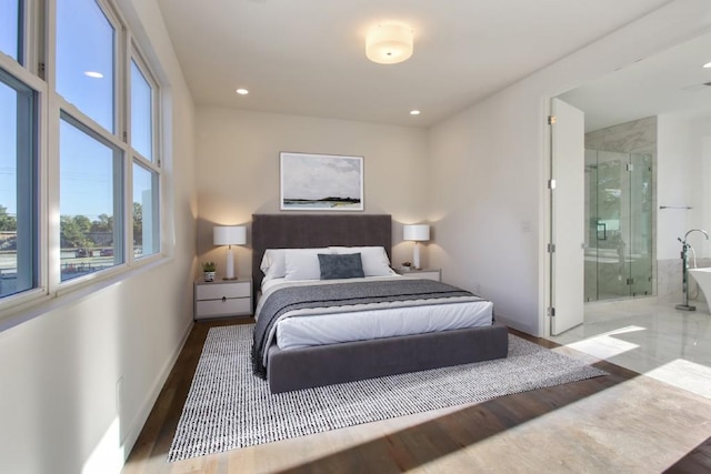 2194 Bristol Cv Unit 13, Chamblee, GA 30341 - bedroom featuring wood finished floors, recessed lighting, and ensuite bath