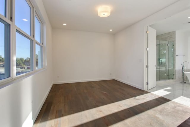 bathroom featuring plus walk in shower and toilet