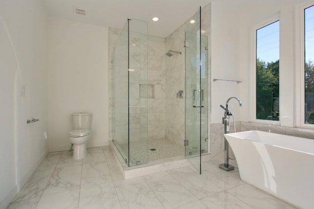 2194 Bristol Cv Unit 13, Chamblee, GA 30341 - full bath featuring a soaking tub, marble finish flooring, a stall shower, and recessed lighting