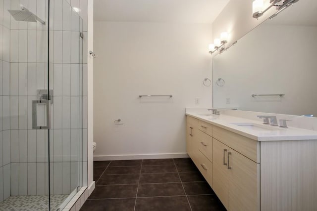2194 Bristol Cv Unit 13, Chamblee, GA 30341 - bathroom with double vanity, a shower stall, and tile patterned flooring
