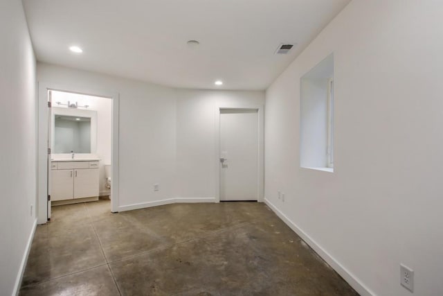 2194 Bristol Cv Unit 13, Chamblee, GA 30341 - empty room with concrete floors and recessed lighting