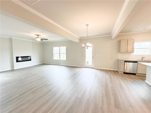 unfurnished living room with a glass covered fireplace, light wood-style flooring, ceiling fan with notable chandelier, and baseboards