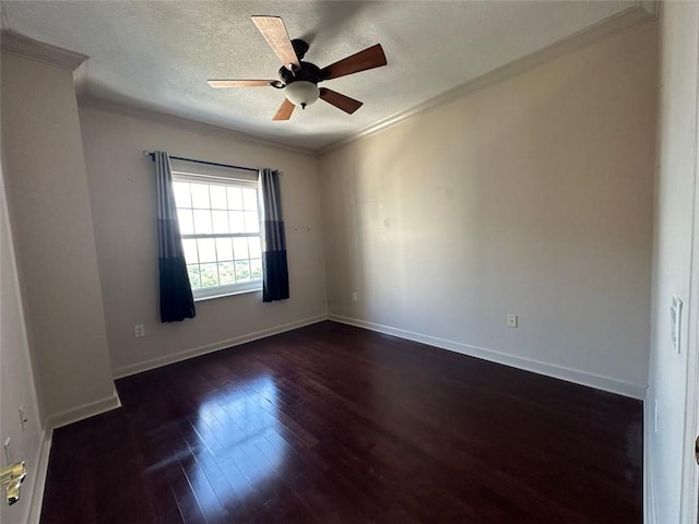 empty room featuring crown molding, ceiling fan, dark hardwood / wood-style flooring, and a textured ceiling