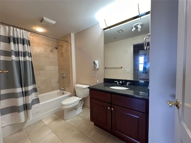 full bathroom featuring tile patterned flooring, vanity, shower / bath combination with curtain, and toilet