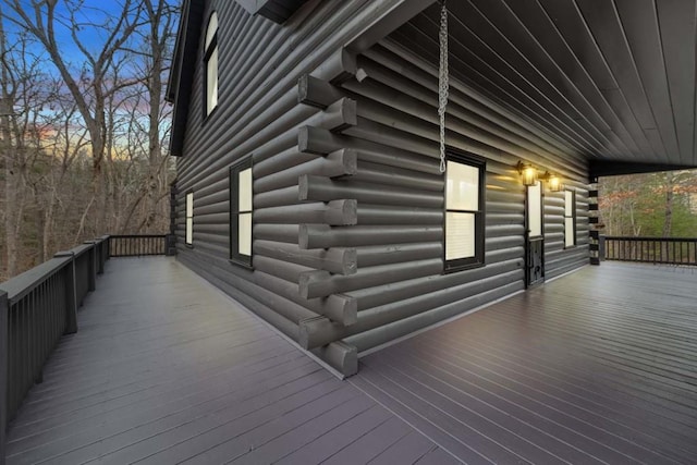 view of deck at dusk