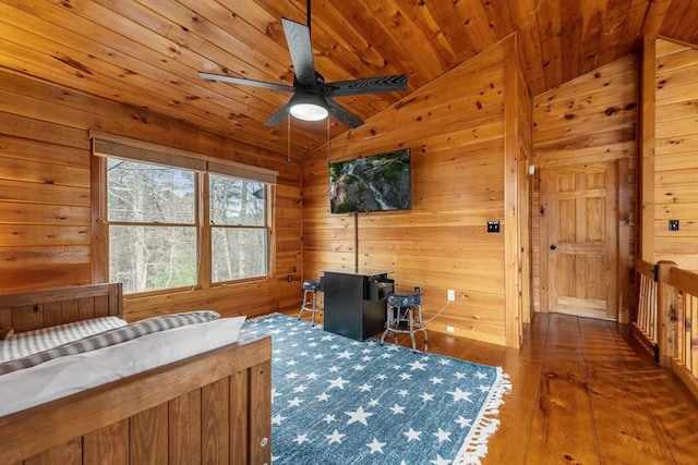 bedroom featuring wood ceiling, wooden walls, vaulted ceiling, and dark wood-type flooring