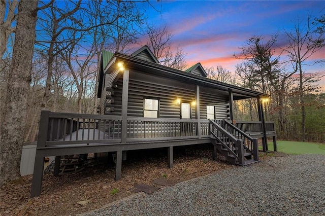 view of front of house featuring log exterior