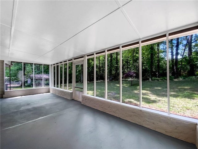 unfurnished sunroom featuring plenty of natural light